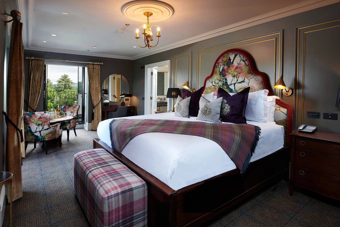 Ecosse cameron house on loch lomond bed with bench